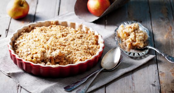 Apple,Crumble,On,The,Wooden,Background,With,Apples,.